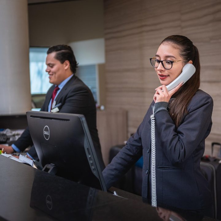 receptionists, phone call, hotel, reception, woman, man, work, attention, lobby, employees, professional, company, assistance, hotel, hotel, hotel, hotel, hotel, reception
